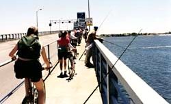 marine parkway bridge, brooklyn: bikers, people fishing